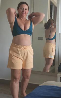 Mature milf in her blue bikini non nude