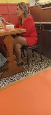 mature spied on in sexy red dress
