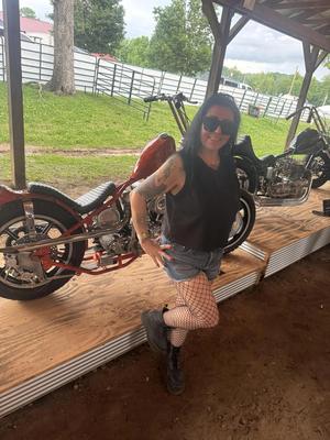 Parte da senhora do motociclista