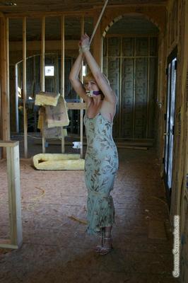 Bound in her summer dress and sandals