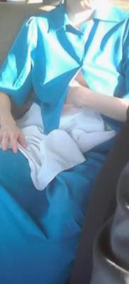 Amish Woman Breastfeeding Blue Dress