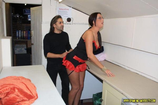Spanking University Emma red edged corset spanked in laundry