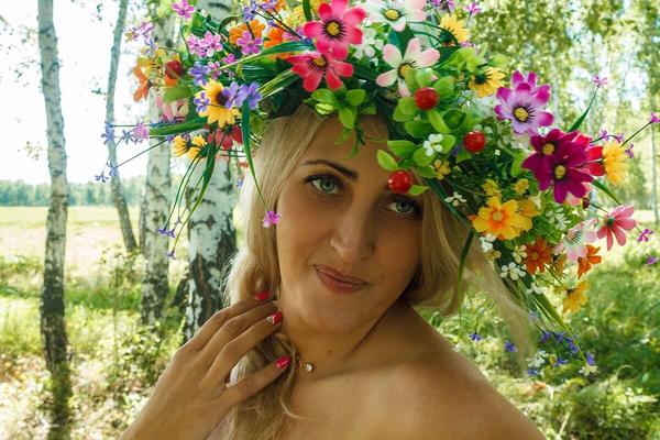 Blonde Anzhelika on the grass