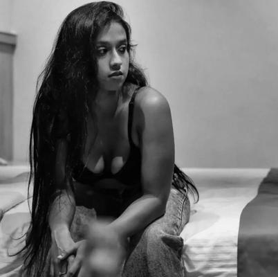 Chesty, cheeky Indian girl likes showing her bottom.